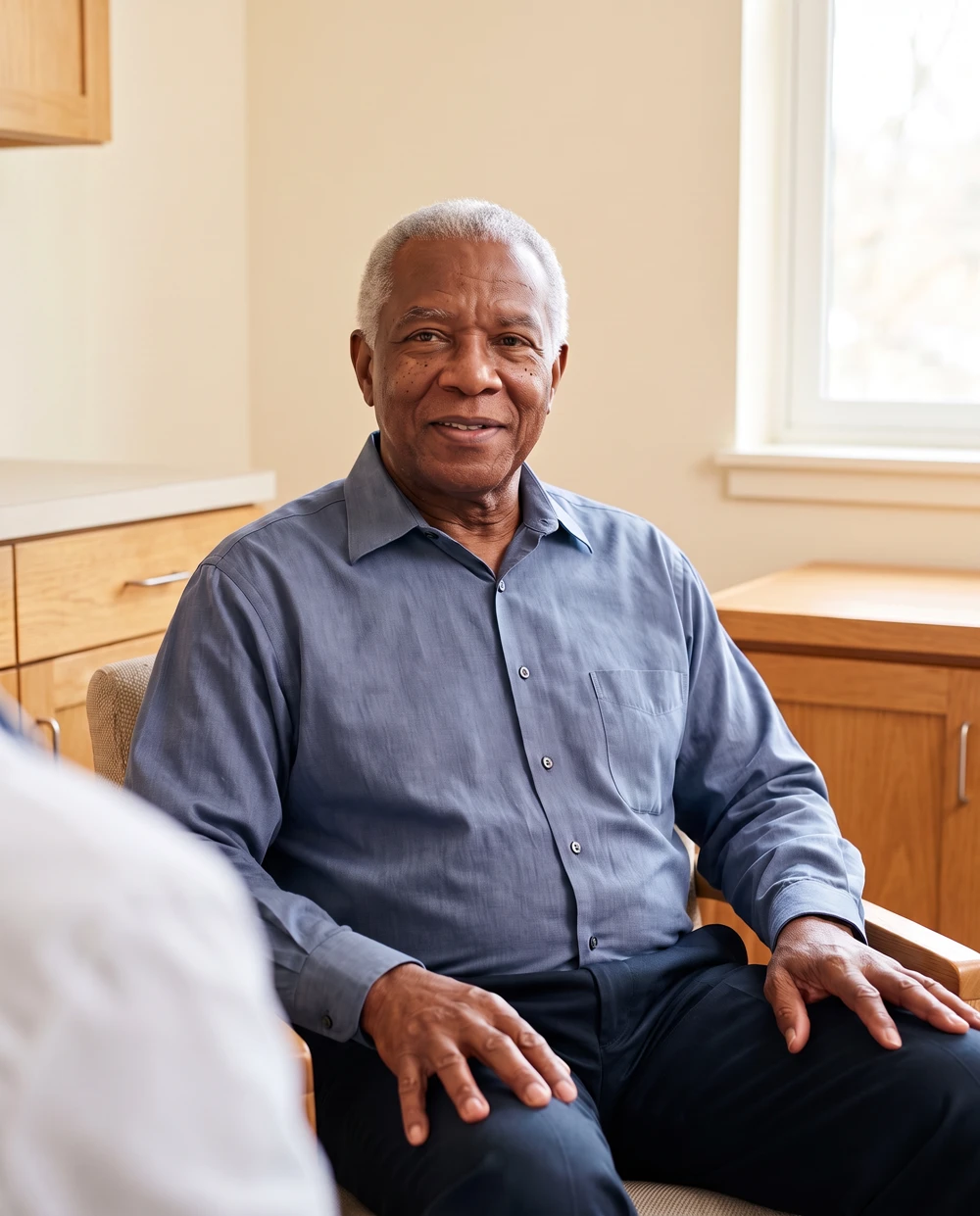 Illustrative older adult patient in a primary care consultation